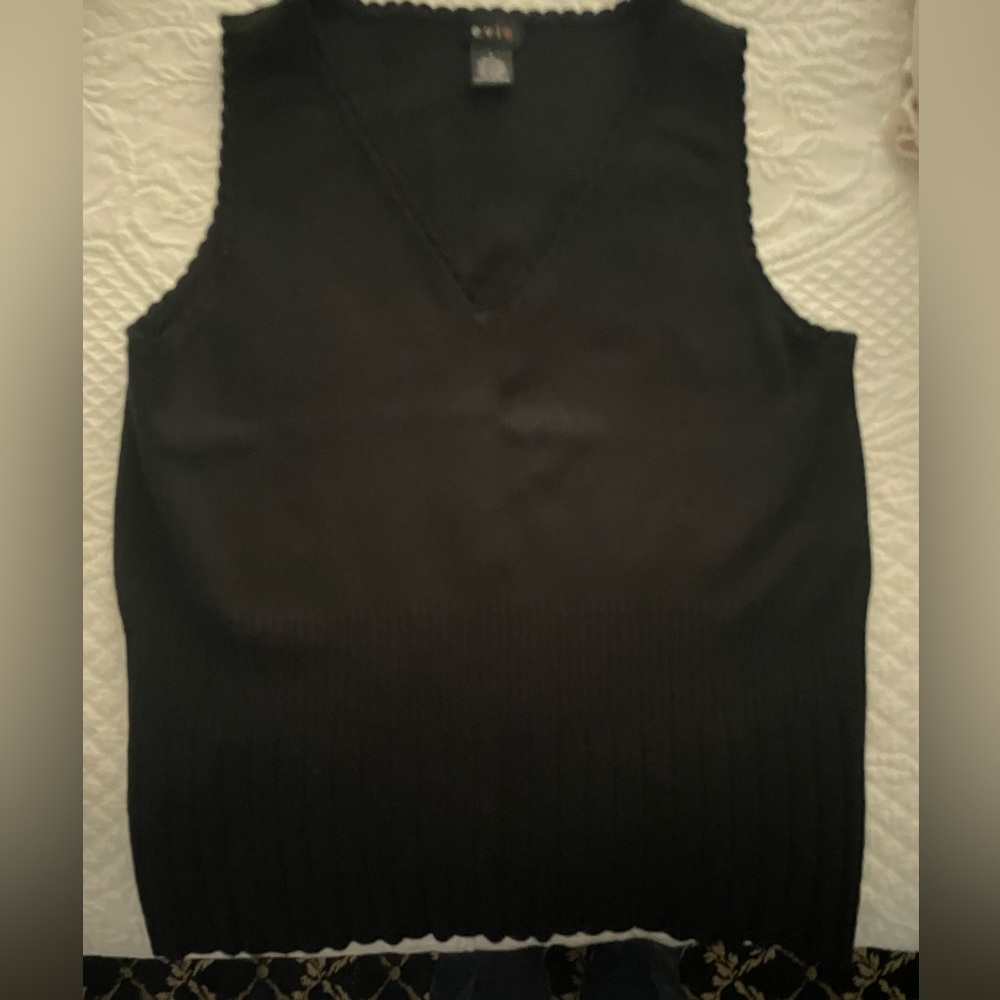 Nice black sleeveless top,  lightweight sweater knit,